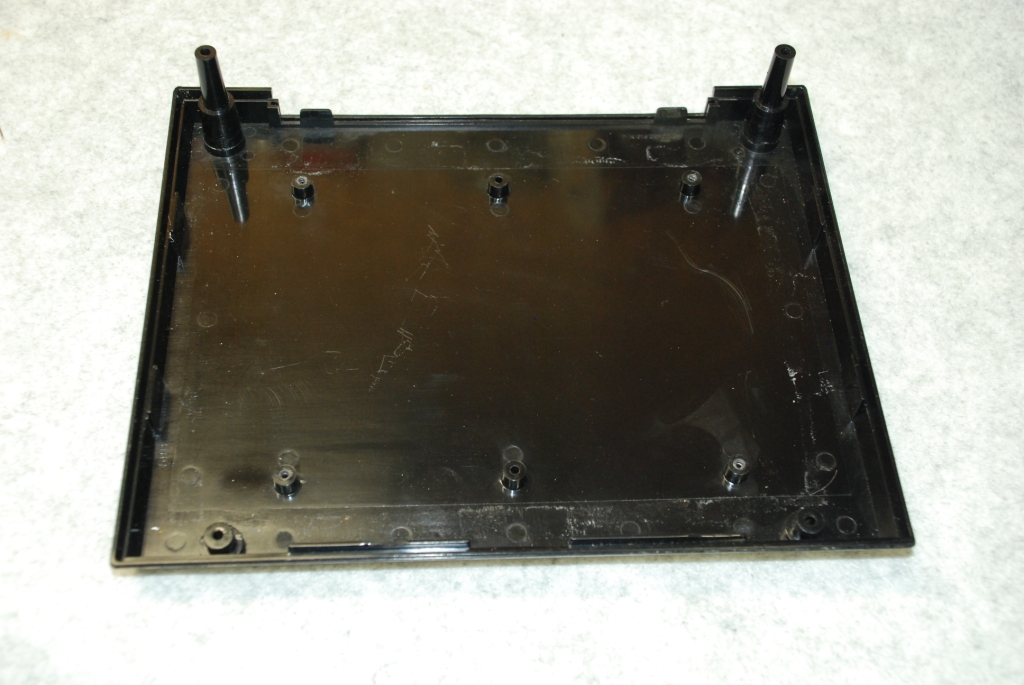 Lower case with mounting bosses.