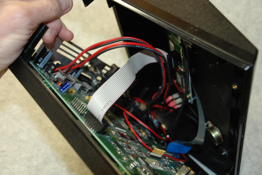 Reconnecting ribbon and keyboard cables.